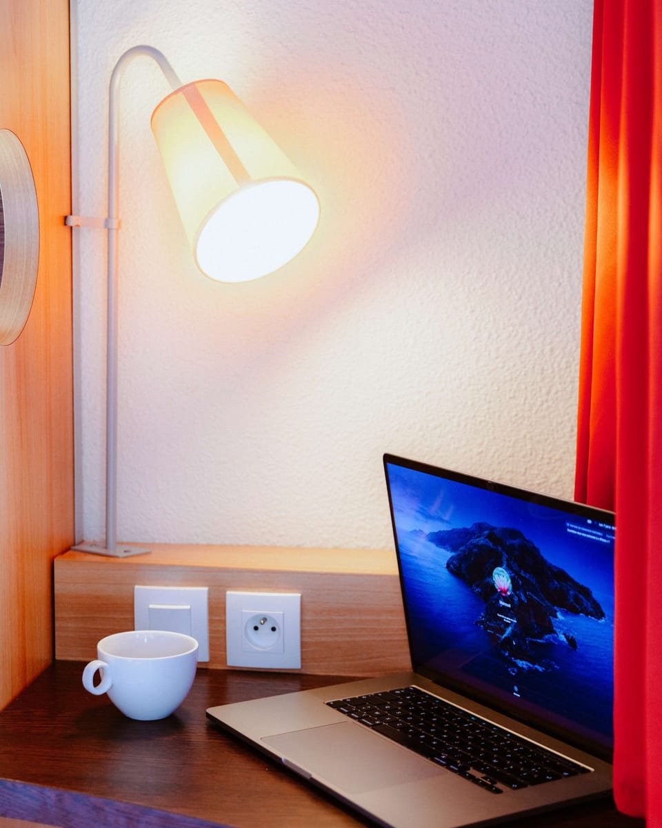 Desk, blackout drapes, iron/ironing board, free cribs/infant beds