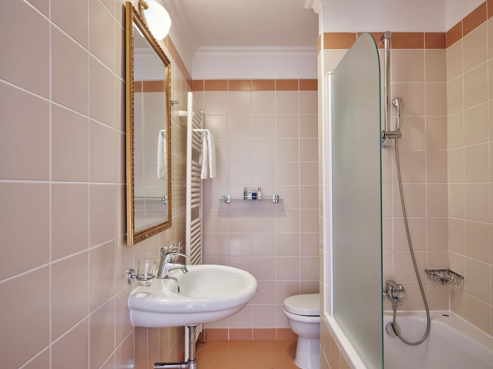 Hair dryer, slippers, towels, soap