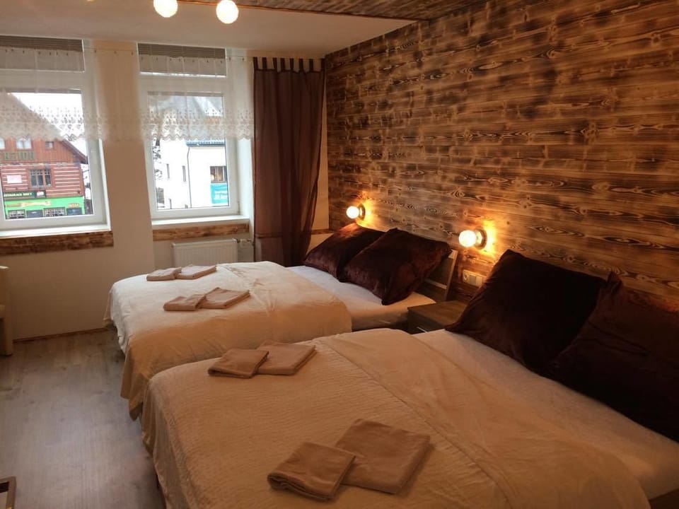 Superior Quadruple Room | In-room safe, free WiFi, bed sheets