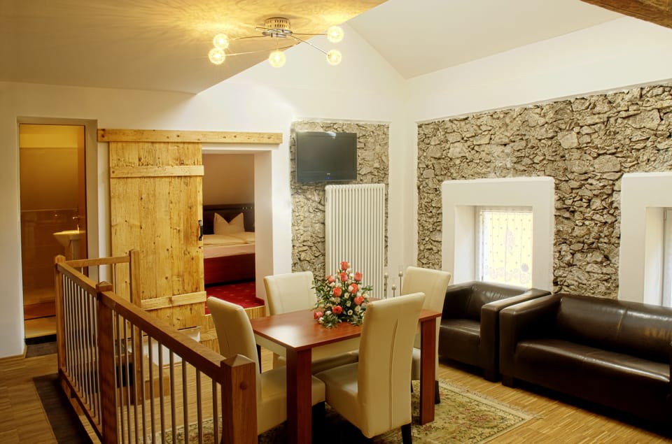 Deluxe Apartment, Annex Building | Living area | Flat-screen TV