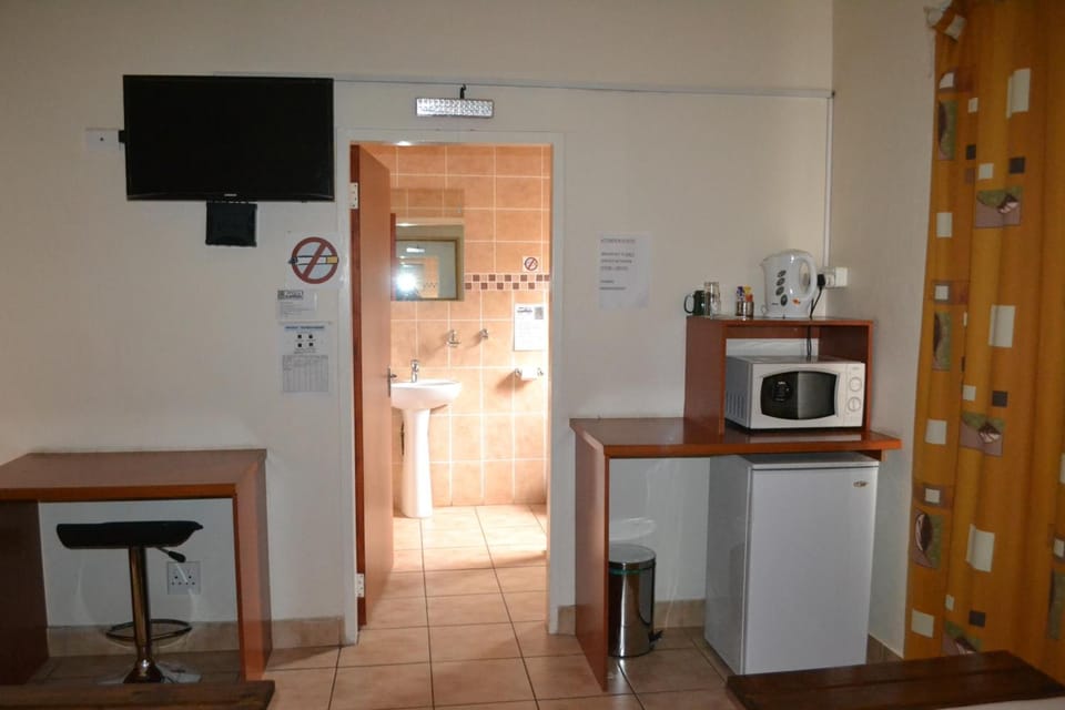 Fridge, microwave, electric kettle, paper towels
