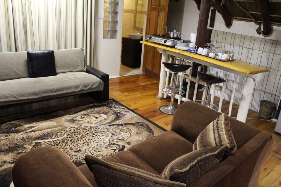 Family Room, 1 Bedroom | Living area | 40-inch TV with satellite channels