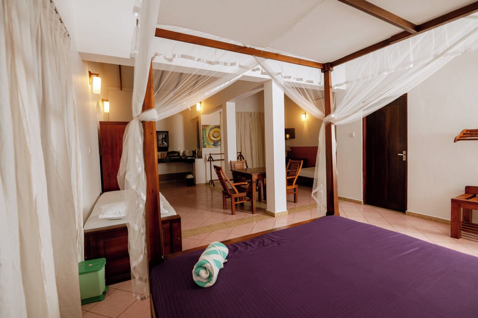 Family Studio Suite, Multiple Beds | Minibar, in-room safe, desk, soundproofing