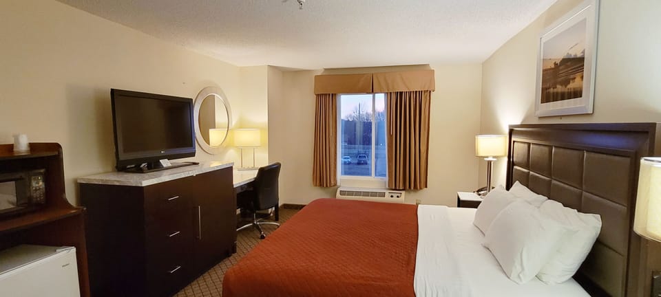 Premium bedding, desk, blackout drapes, iron/ironing board