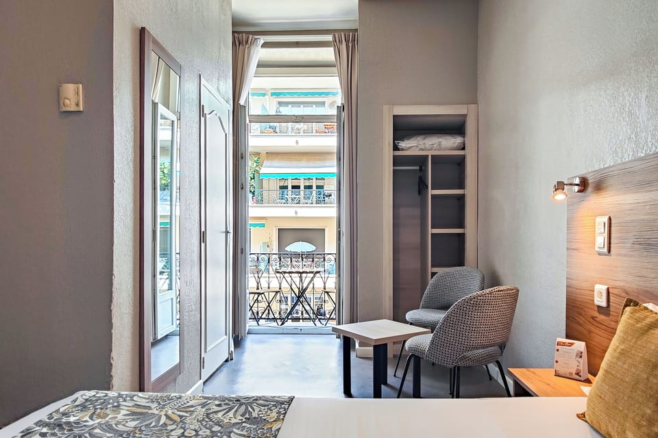 Classic Double Room, Balcony | Minibar, in-room safe, desk, laptop workspace