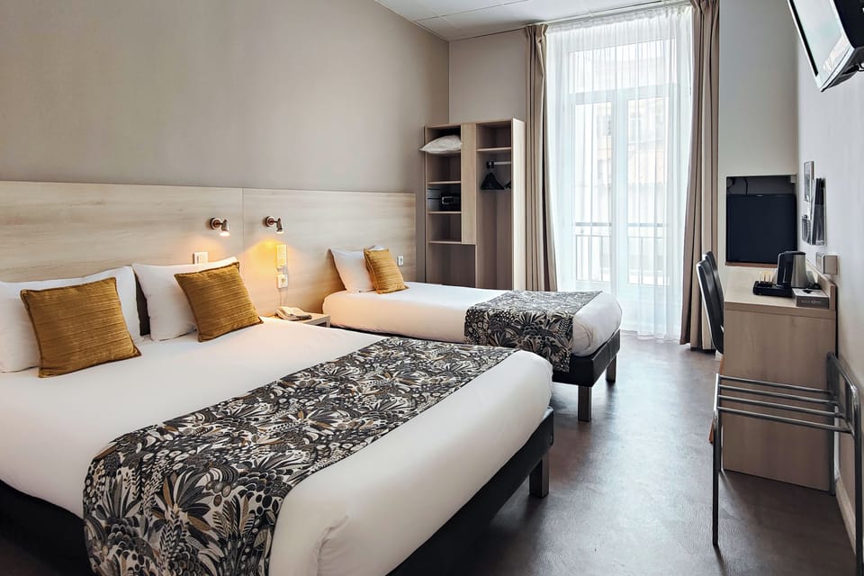 Superior Triple Room | Minibar, in-room safe, desk, laptop workspace