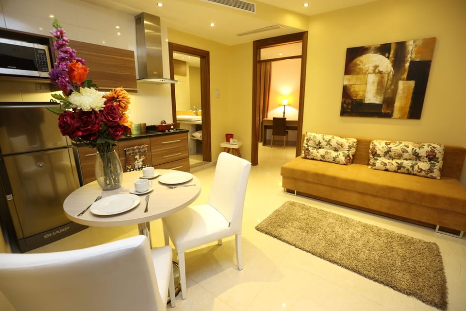 Apartment, 1 Bedroom | Pillowtop beds, in-room safe, blackout drapes, soundproofing