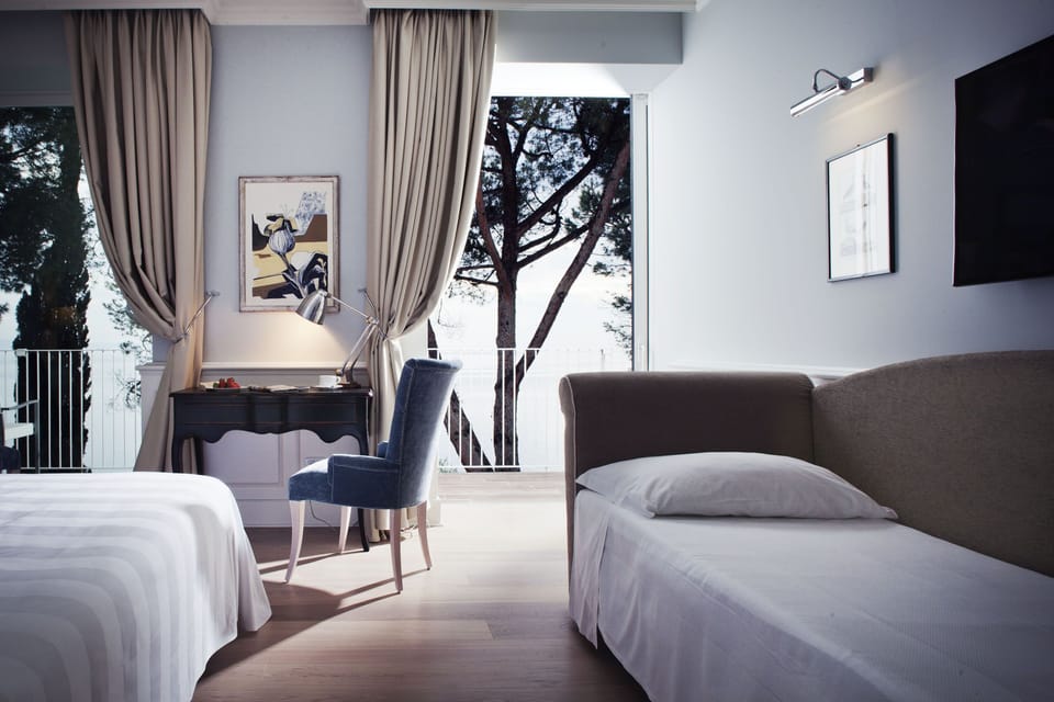 Family Room, Sea View | Minibar, in-room safe, desk, soundproofing