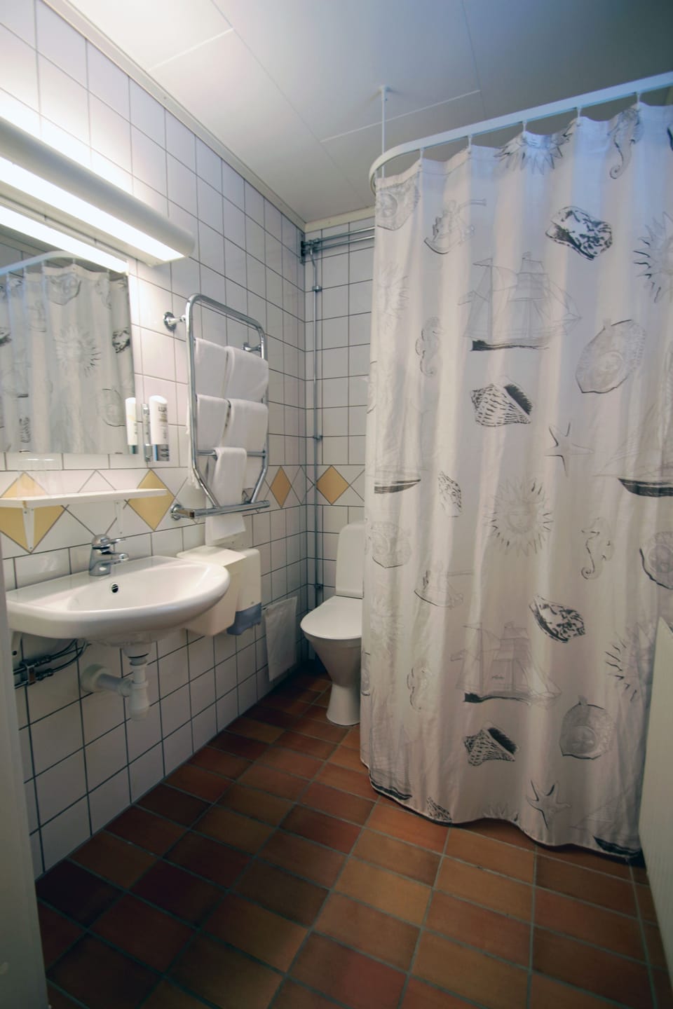 Shower, free toiletries, hair dryer (on request), towels