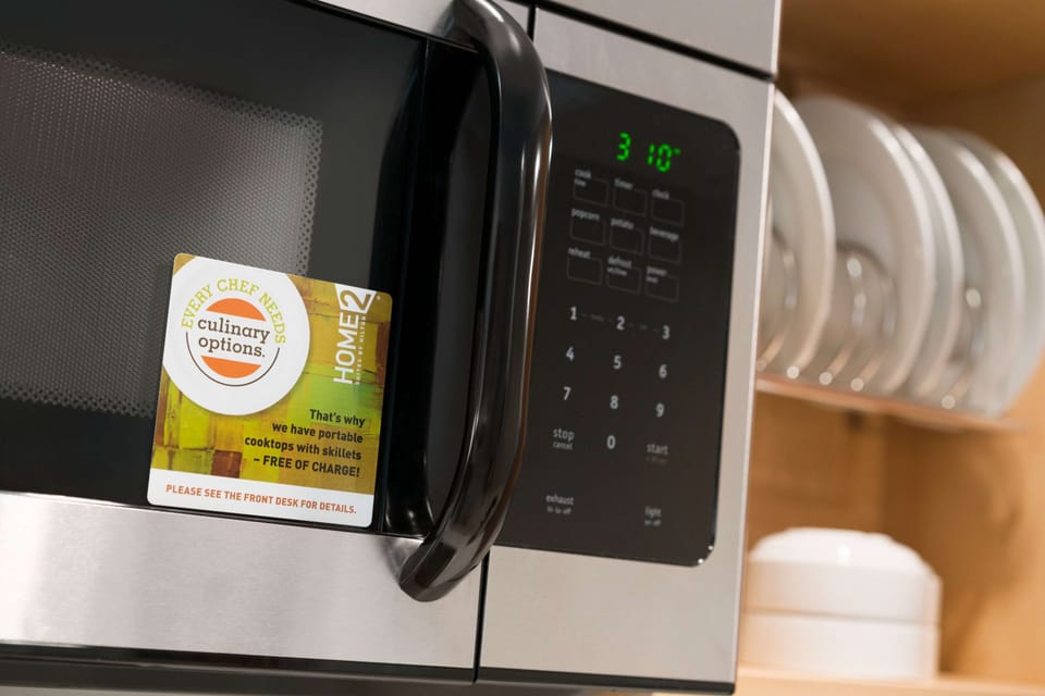 Full-size fridge, microwave, dishwasher, coffee/tea maker