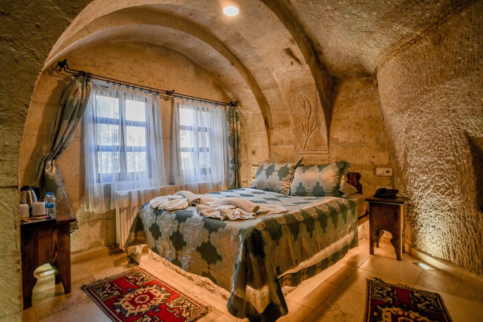 Cozy Cave Room | Egyptian cotton sheets, premium bedding, down comforters, desk