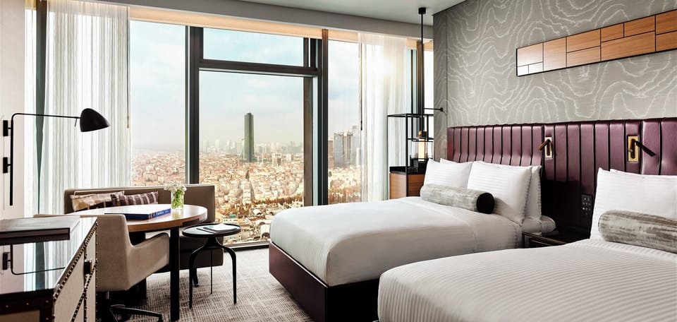 Premium bedding, pillowtop beds, minibar, in-room safe