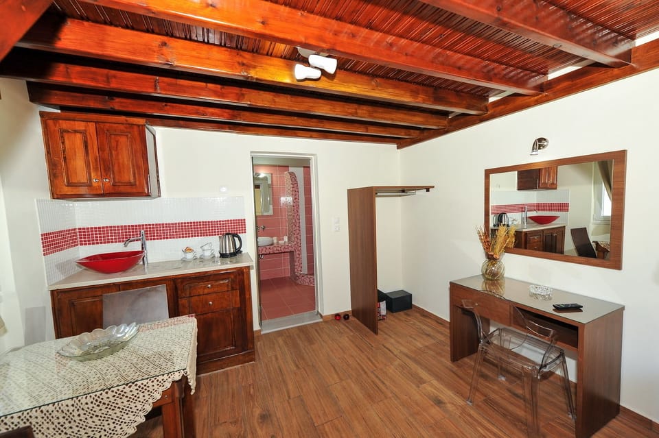 Suite, Mezzanine | Living area | Flat-screen TV