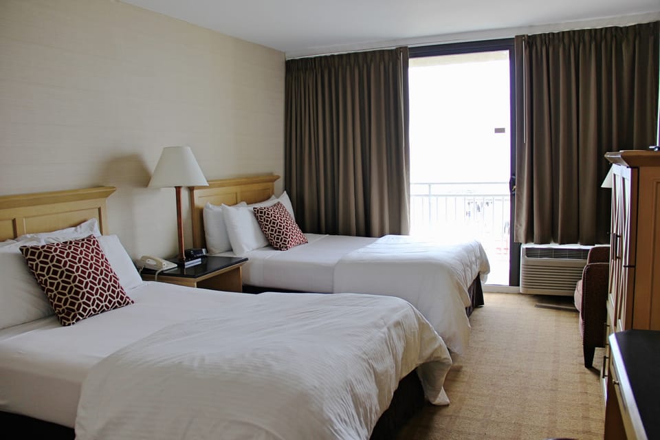Room, 2 Double Beds | Hypo-allergenic bedding, down comforters, in-room safe