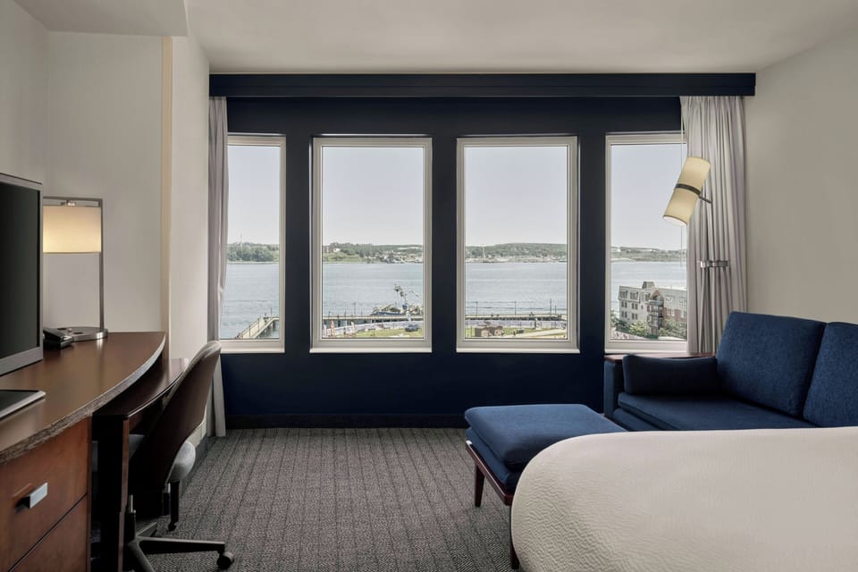 Room, 1 King Bed with Sofa bed (Water View) | Premium bedding, in-room safe, desk, laptop workspace