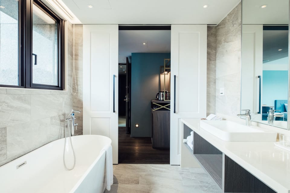 Shower, free toiletries, hair dryer, slippers