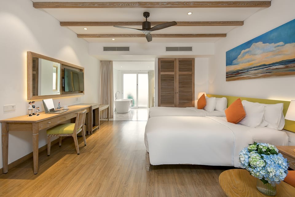 Junior Suite Twin Room, Balcony, Pool View | Premium bedding, minibar, in-room safe, desk