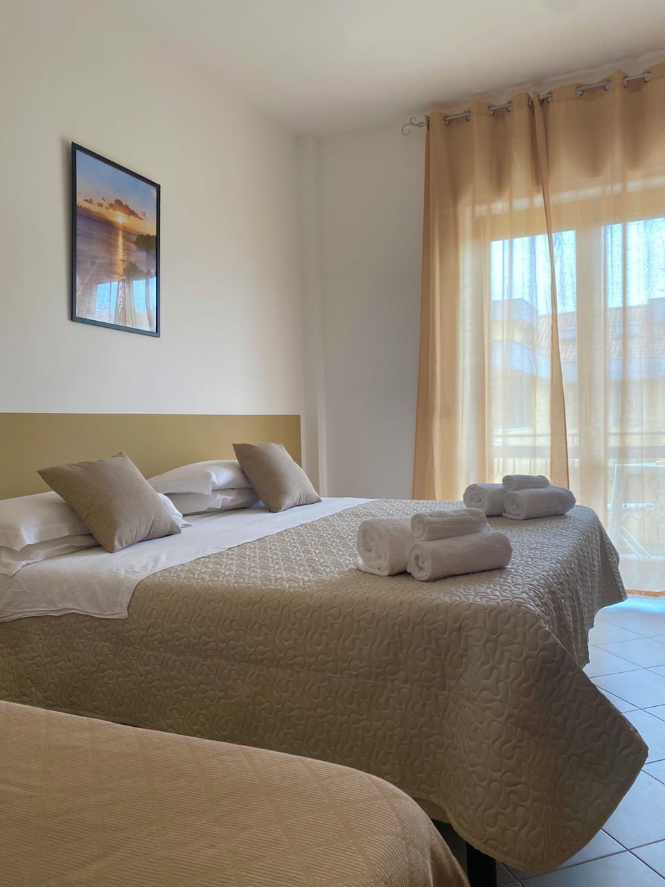 Triple Room, Balcony | Individually furnished, desk, blackout drapes, free WiFi