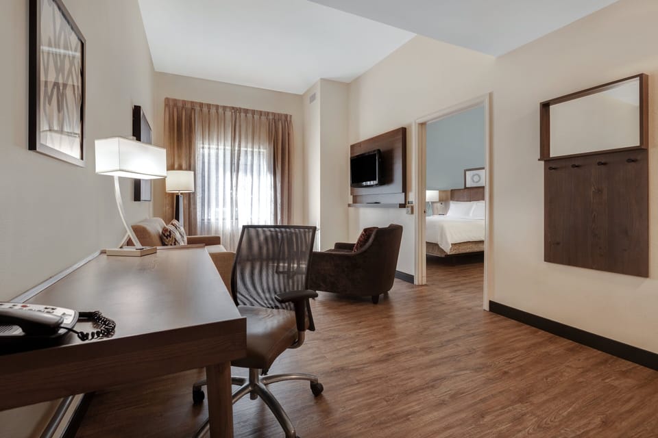 Hypo-allergenic bedding, down comforters, in-room safe, desk