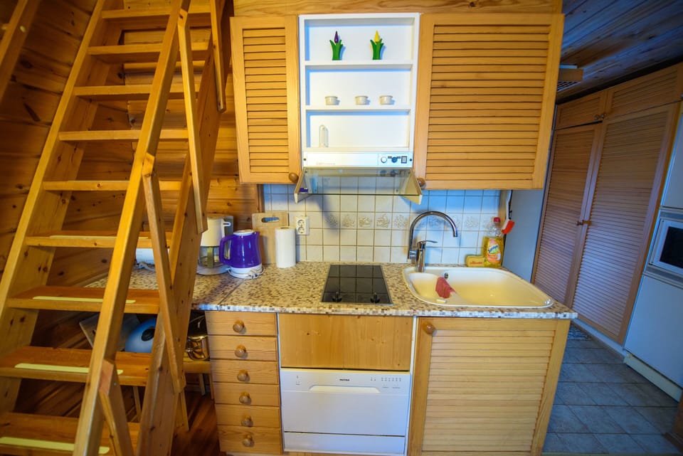 Cottage, Sauna, Lakeside | Private kitchen | Fridge, microwave, coffee/tea maker, eco-friendly cleaning products