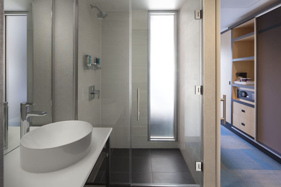 Shower, rainfall showerhead, free toiletries, hair dryer