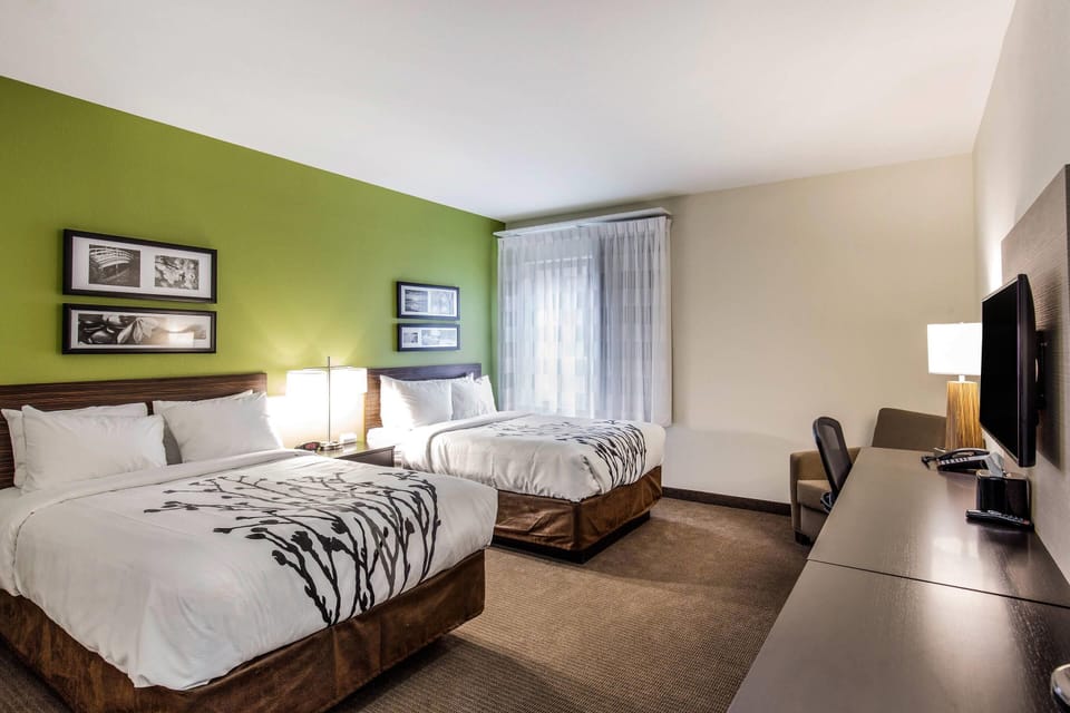 Premium bedding, desk, blackout drapes, iron/ironing board