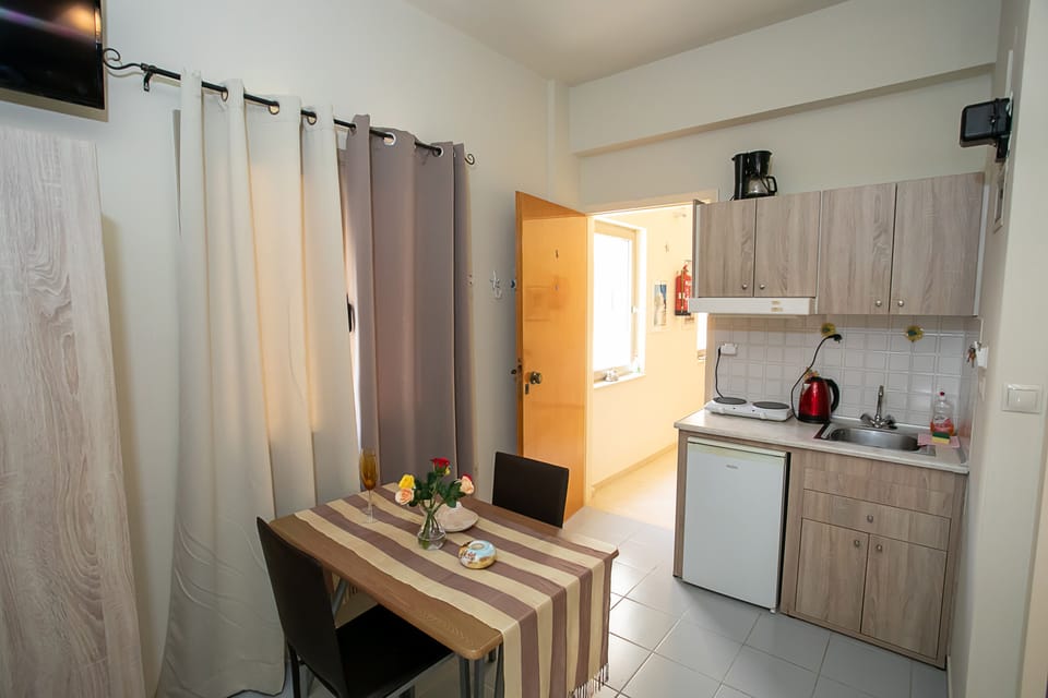 Romantic Double Room, Balcony, Oceanfront | Private kitchen | Fridge, stovetop, coffee/tea maker, electric kettle