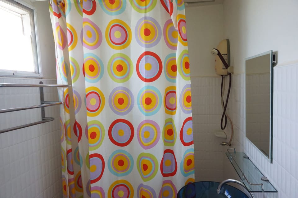 Standard King Bed | Bathroom | Shower, free toiletries, towels