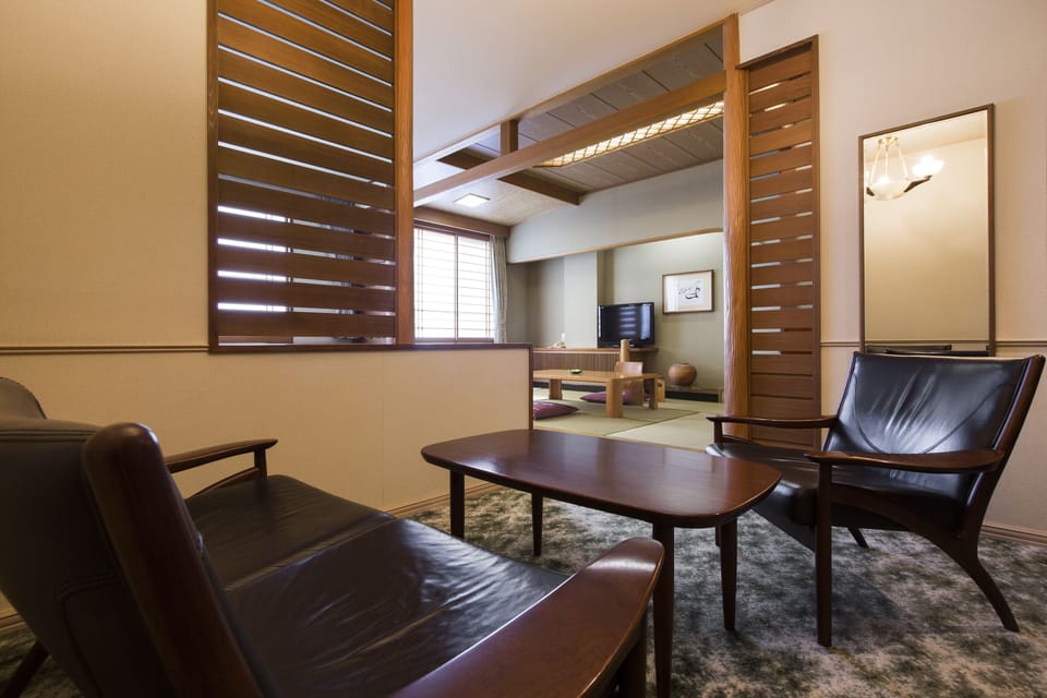 Deluxe Room | Premium bedding, in-room safe, blackout drapes, iron/ironing board