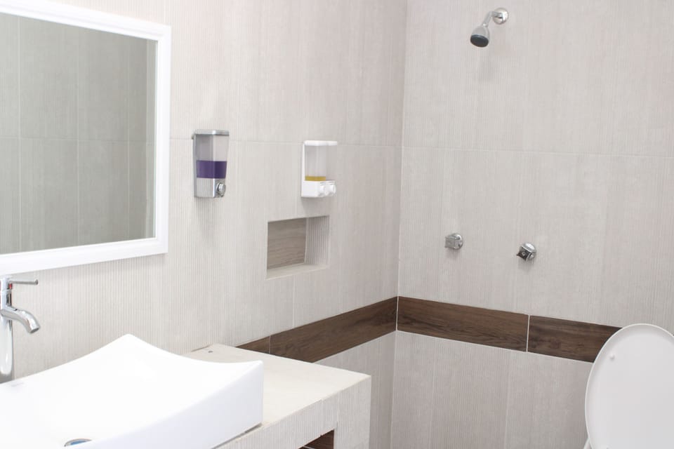 Superior Double Room, 1 King Bed, Garden Area | Bathroom | Shower, rainfall showerhead, free toiletries, towels