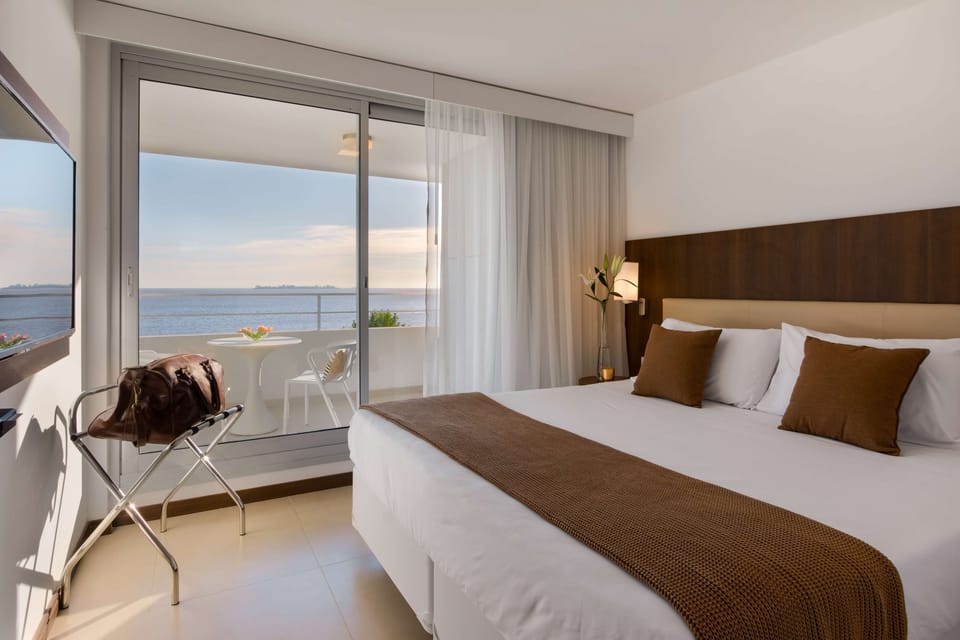 Suite, 1 King Bed, River View | 1 bedroom, in-room safe, desk, blackout drapes