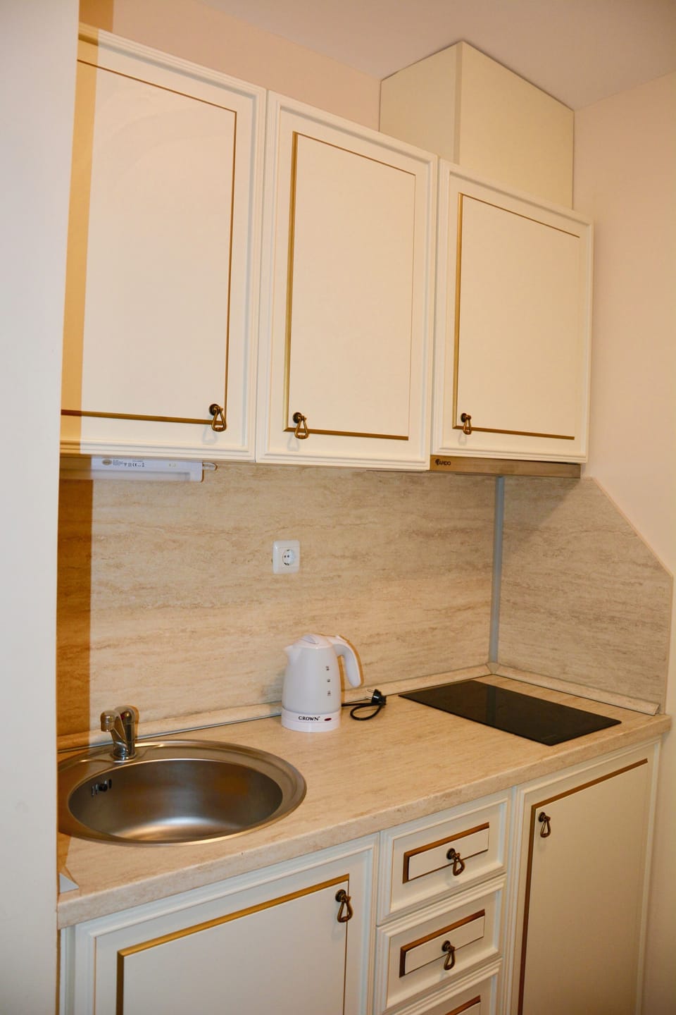 Mini-fridge, microwave, stovetop, electric kettle