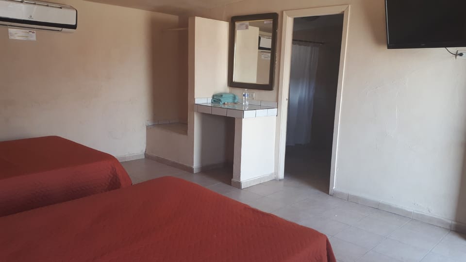 Standard Quadruple Room, 2 Double Beds | Iron/ironing board, free WiFi, bed sheets