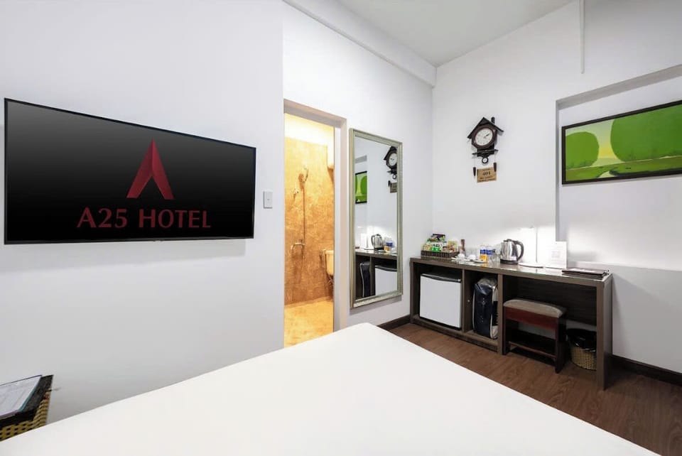 Standard Double Room | Minibar, in-room safe, blackout drapes, iron/ironing board