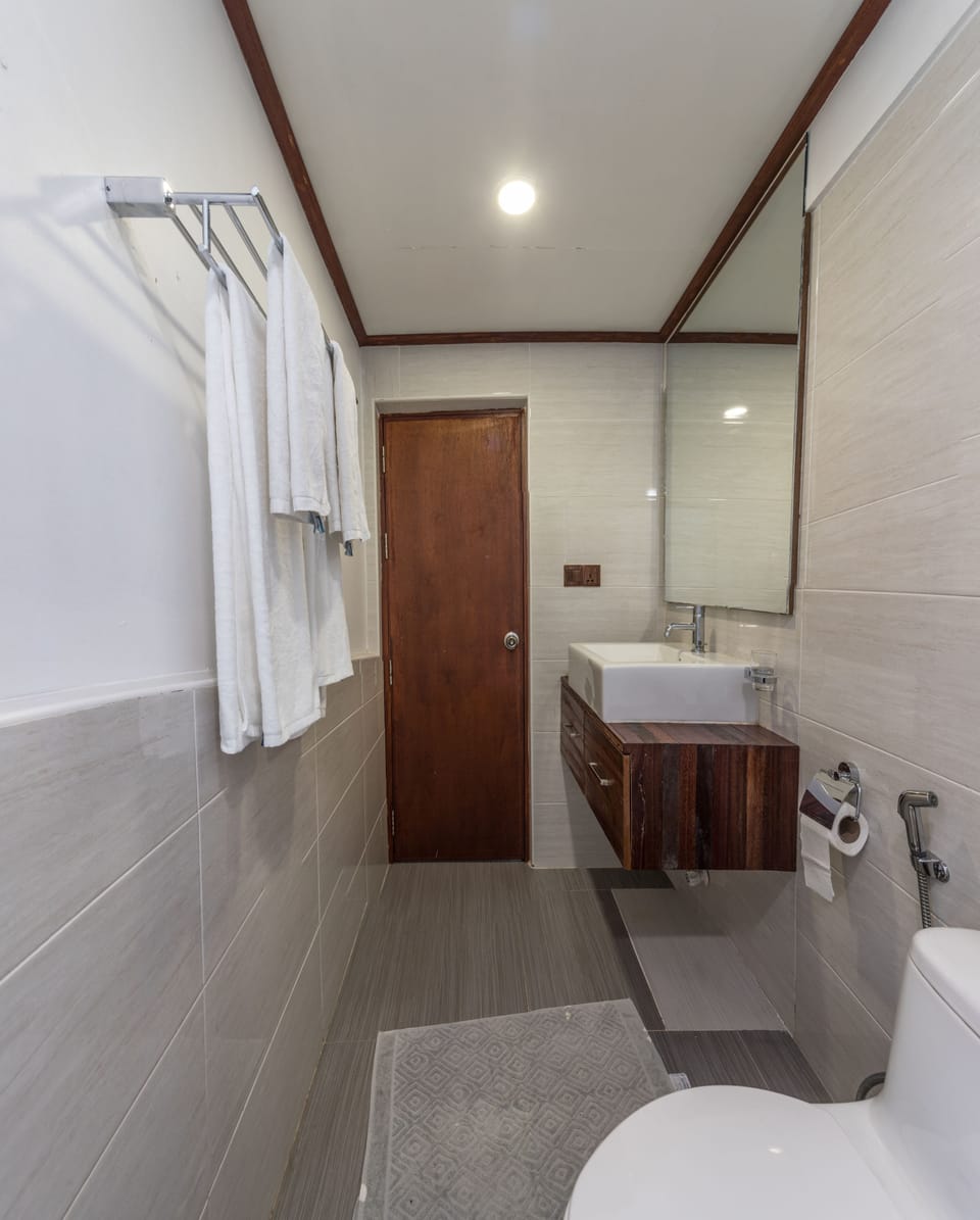 Family Room, Sea View | Bathroom | Shower, free toiletries, hair dryer, towels