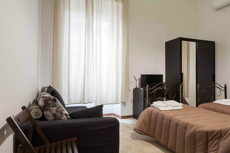 Triple Room, Private Bathroom | Individually decorated, individually furnished, desk, blackout drapes