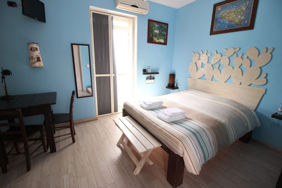 Room (Blue) | Premium bedding, in-room safe, individually decorated