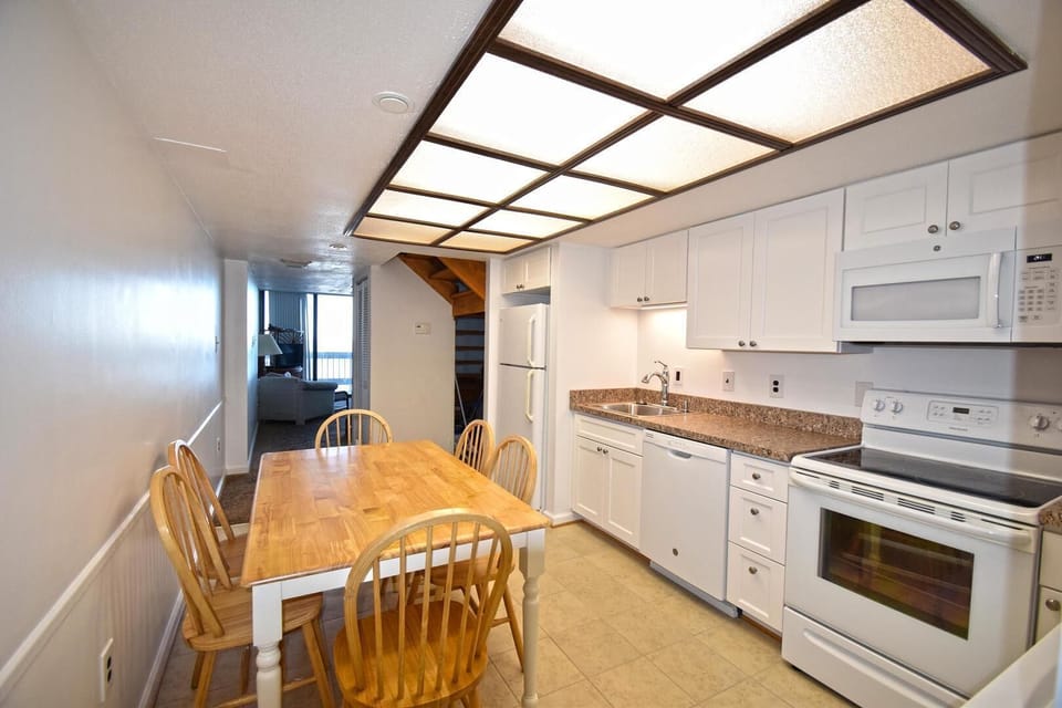 Condo, 2 Bedrooms | Private kitchen | Full-size fridge, microwave, oven, stovetop