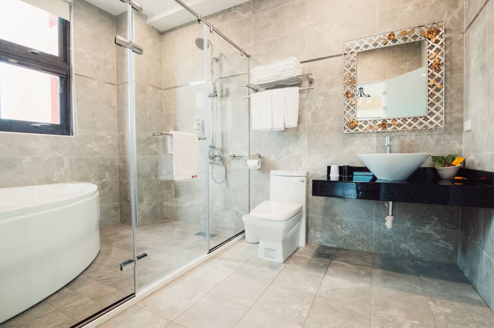 Classic Quadruple Room (North Africa Style) | Bathroom | Designer toiletries, hair dryer, slippers, towels