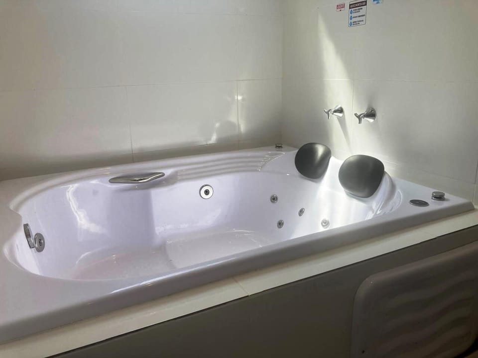 Deluxe Double Room, 1 King Bed, Jetted Tub | Minibar, laptop workspace, blackout drapes, iron/ironing board