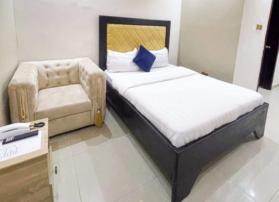Standard Room | In-room safe, desk, laptop workspace, blackout drapes