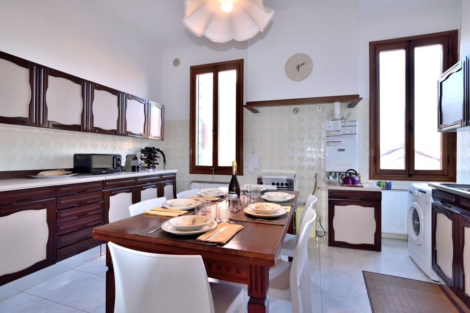 Apartment, 4 Bedrooms | Private kitchen | Full-size fridge, microwave, oven, stovetop