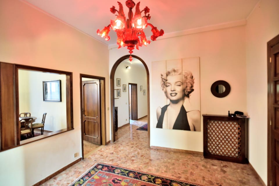 Apartment, 4 Bedrooms | Living area | Flat-screen TV, DVD player
