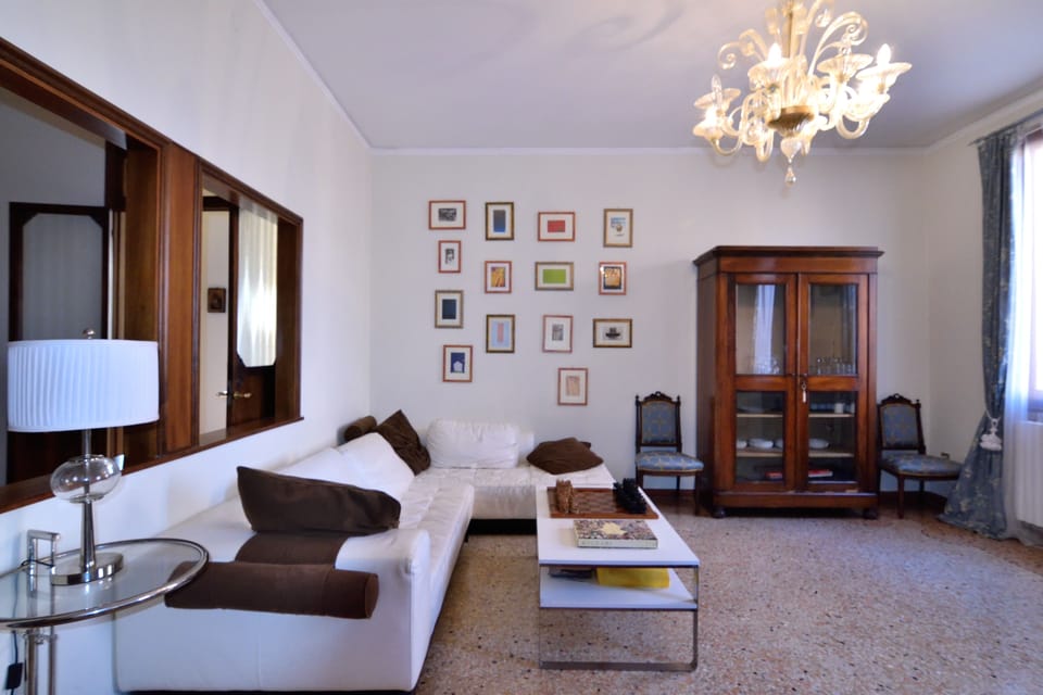Apartment, 4 Bedrooms | Living area | Flat-screen TV, DVD player