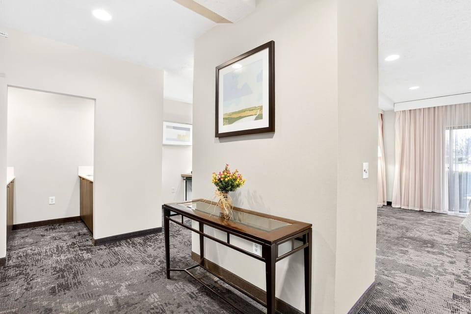 Suite, 1 King Bed, Jetted Tub | Living area | TV, pay movies