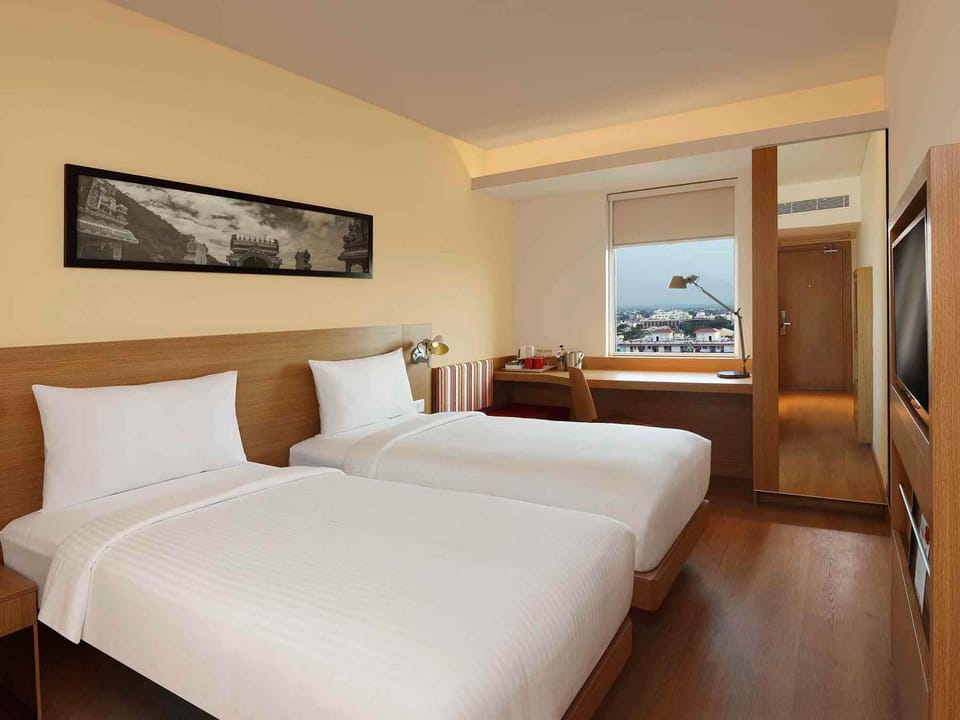 Premium bedding, memory foam beds, minibar, in-room safe