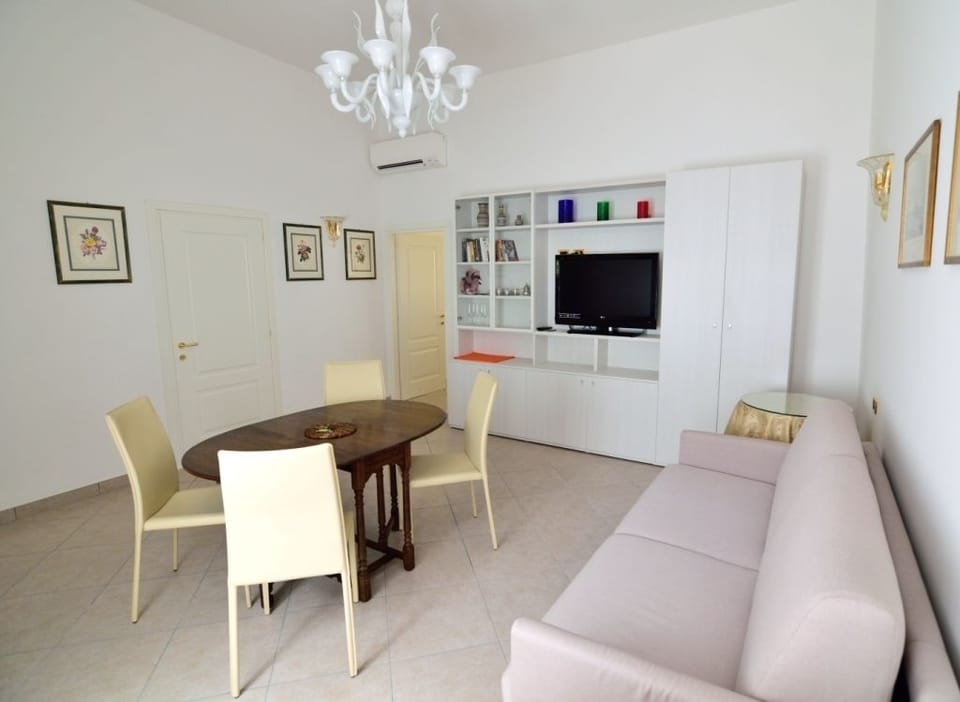 Apartment, 1 Bedroom | Living area | Flat-screen TV