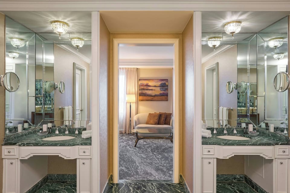 Designer toiletries, hair dryer, bathrobes, towels