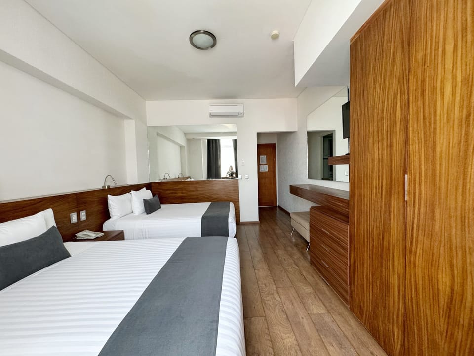 Superior Double Room, 2 Double Beds | In-room safe, desk, laptop workspace, blackout drapes