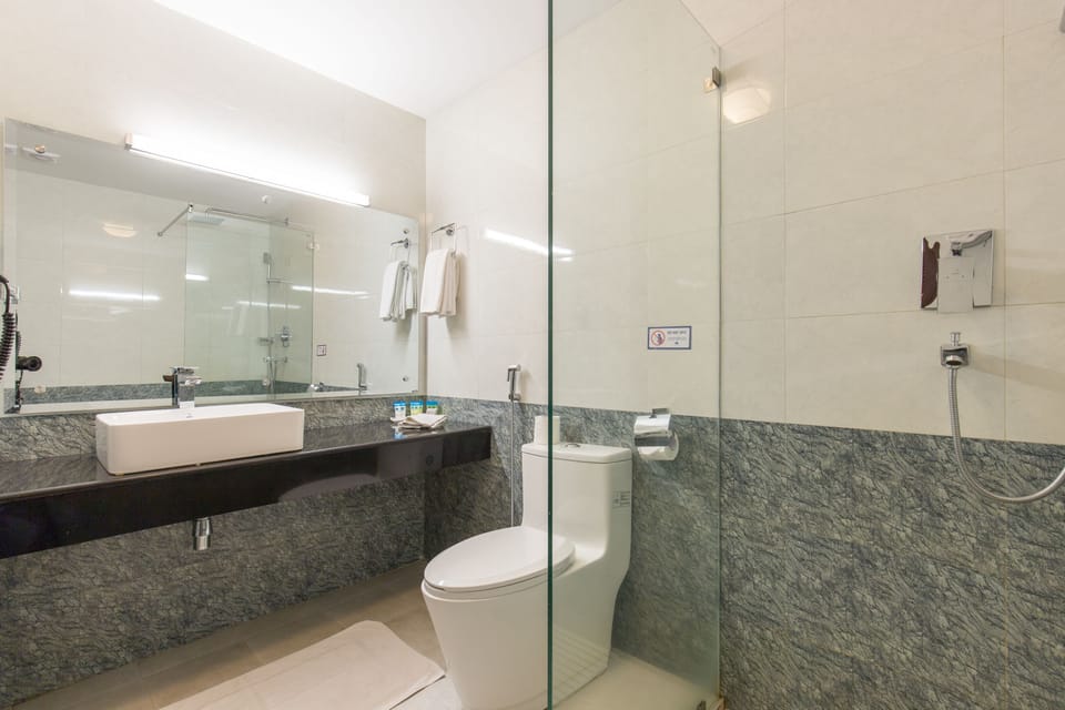 Eco-friendly toiletries, hair dryer, bathrobes, slippers
